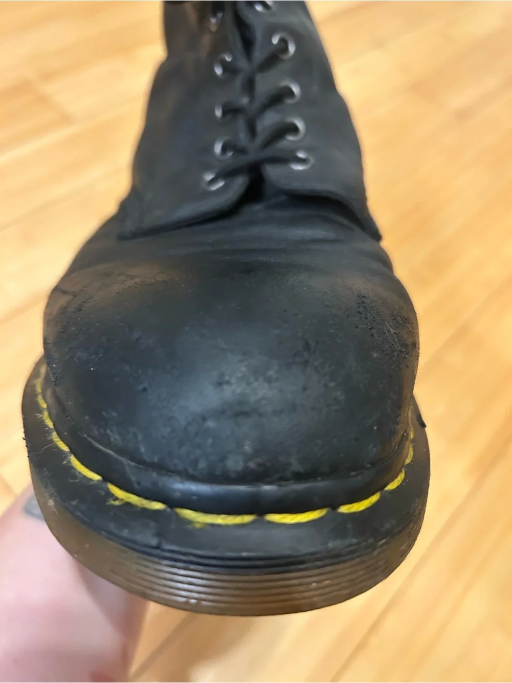 Dr. Martens Black Leather 8-Eye Lace-Up Boots with Yellow Stitching